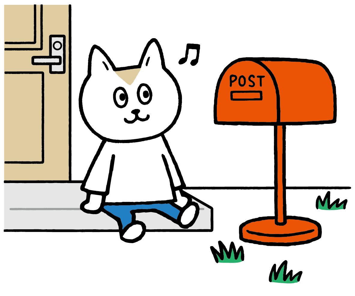 Cute cat sitting next to a mailbox